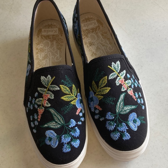 Rifle Paper Co. Shoes - Rifle Paper Co. Keds Black Slip-On Sneakers with Blue Floral Embroidery